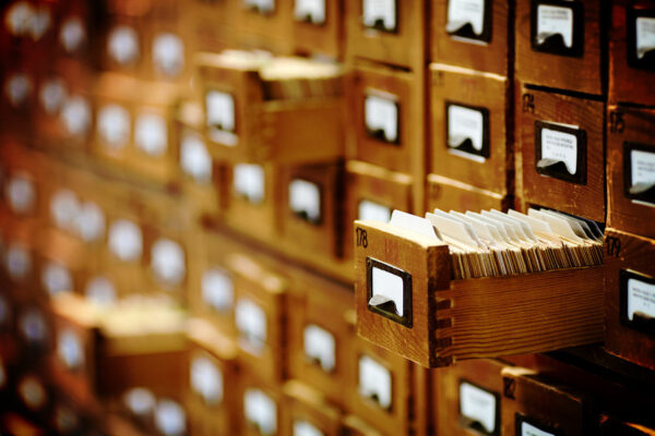 database concept. vintage cabinet. library card or file catalog.